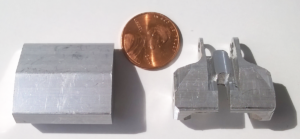 Left: Extruded Aluminum Blank Right: Machined Base by Falmer